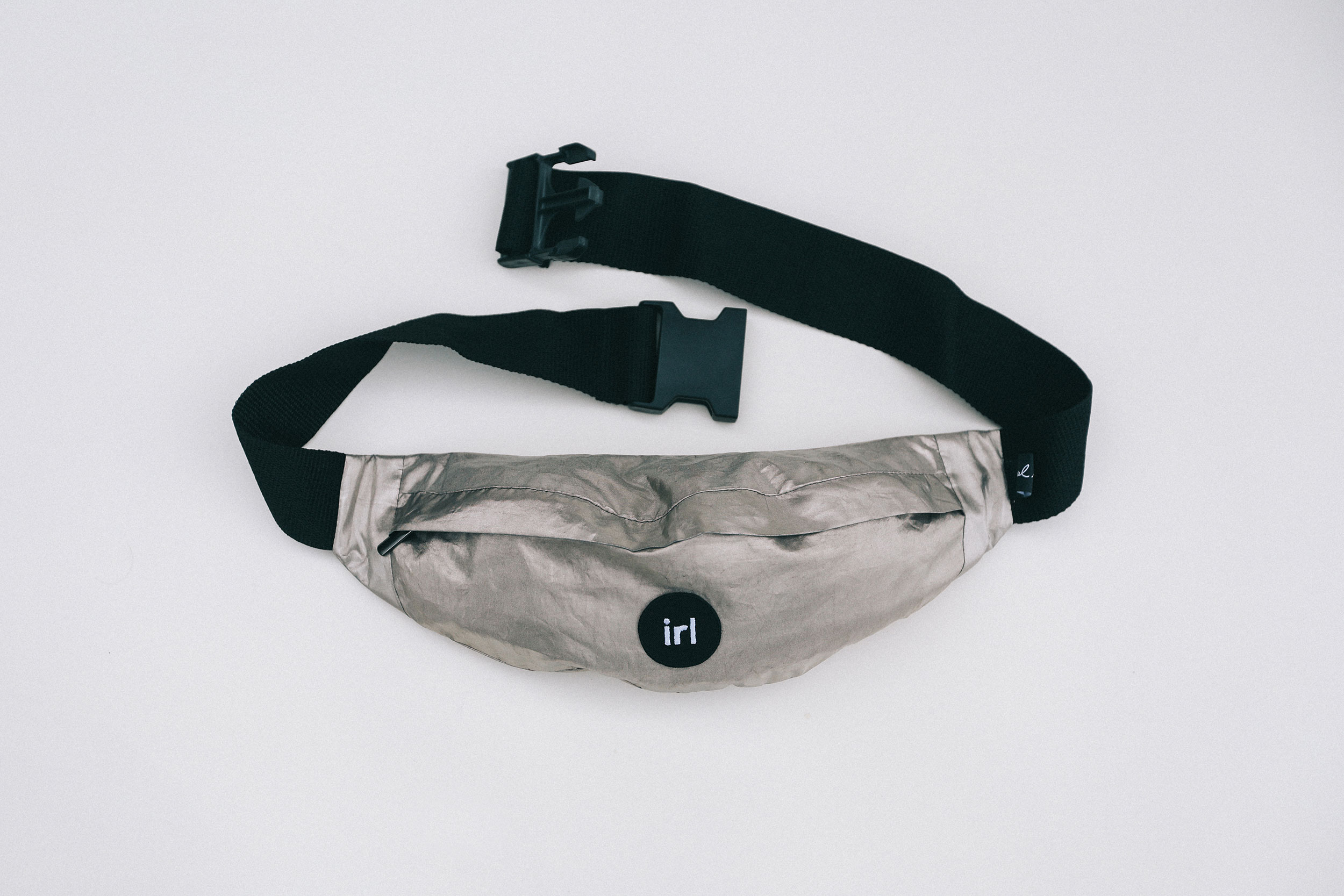 IRL Pack — flat lay with strap