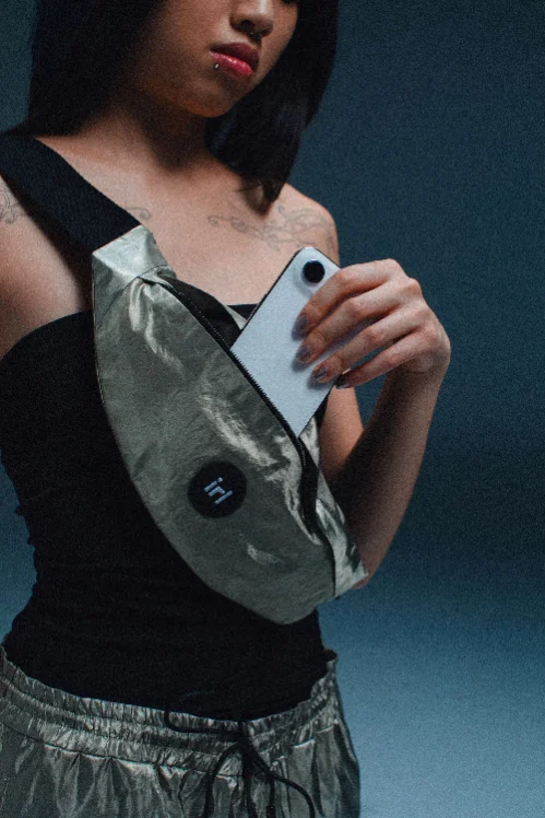 Phone into the pack — detail